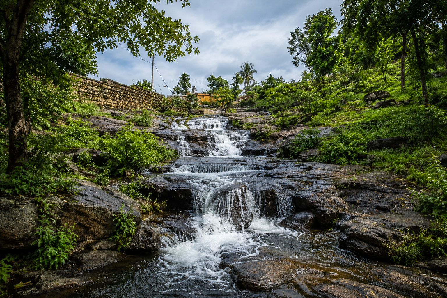 Seasonal waterfall and forest trail